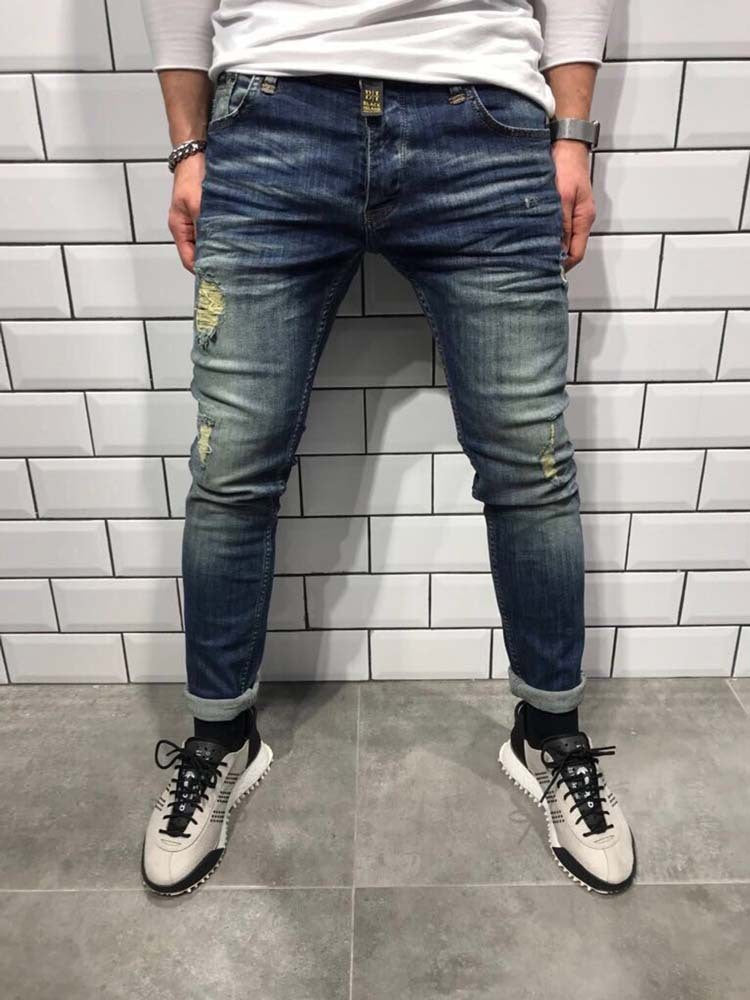 Herren-Jeans mit schmalem Fuß und Löchern