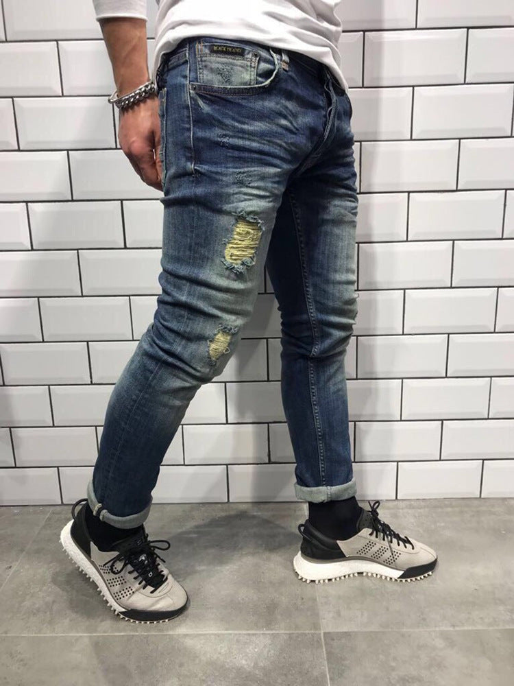 Herren-Jeans mit schmalem Fuß und Löchern