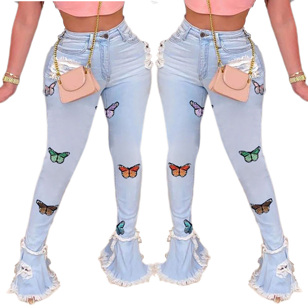 Modische Schmetterlings-bestickte Rüschen-Loch-Denim-Hose