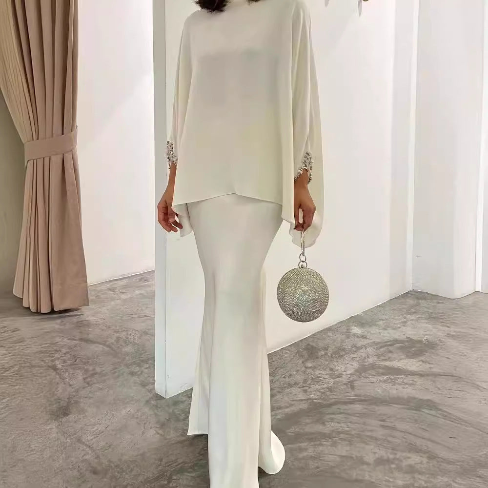 Damenkleid mit Perlen und Perlmutt