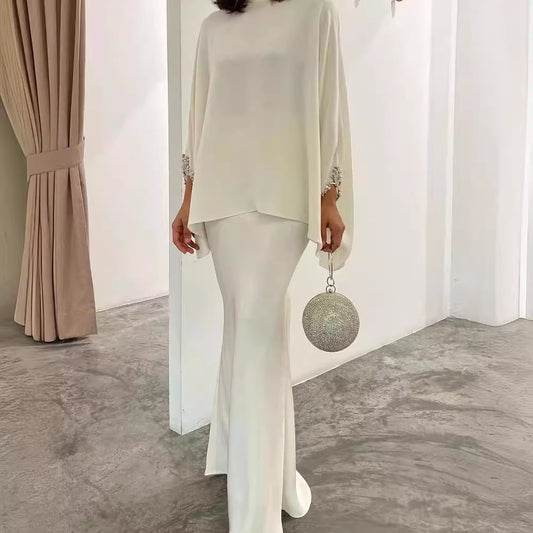 Damenkleid mit Perlen und Perlmutt